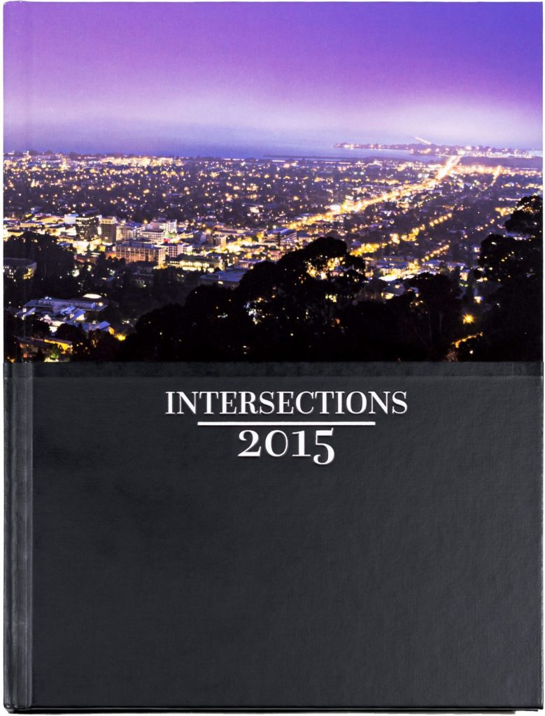 Yearbook cover with title 'Intersections' and date 2015. The top half of the cover features a photo overlooking the eastern part of the San Francisco Bay Area.